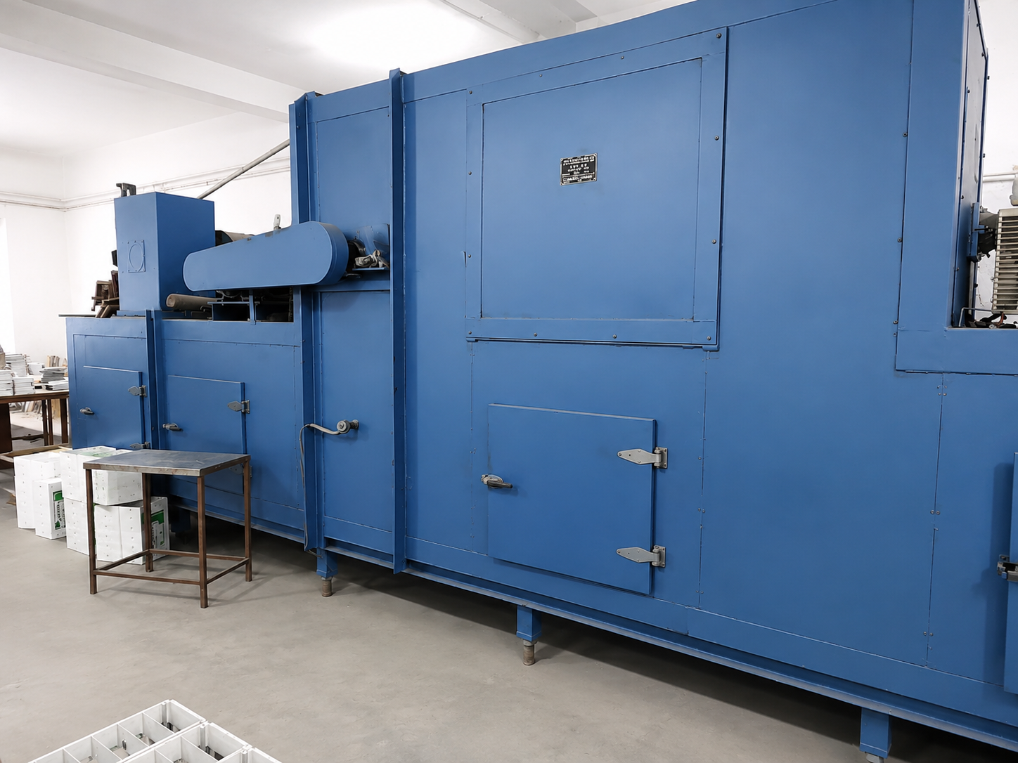 SHARP Manufacturing Facility – plate preparation area, factory floor with industrial equipment